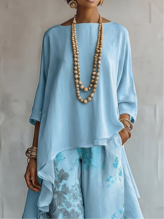 Top Asimmetrico Blu e Set di Pantaloni a Gamba Larga con Fantasia Floreale