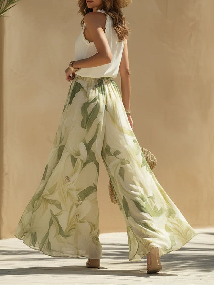 Set Top Senza Maniche in Chiffon con Volant e Pantaloni con Stampa di Gigli