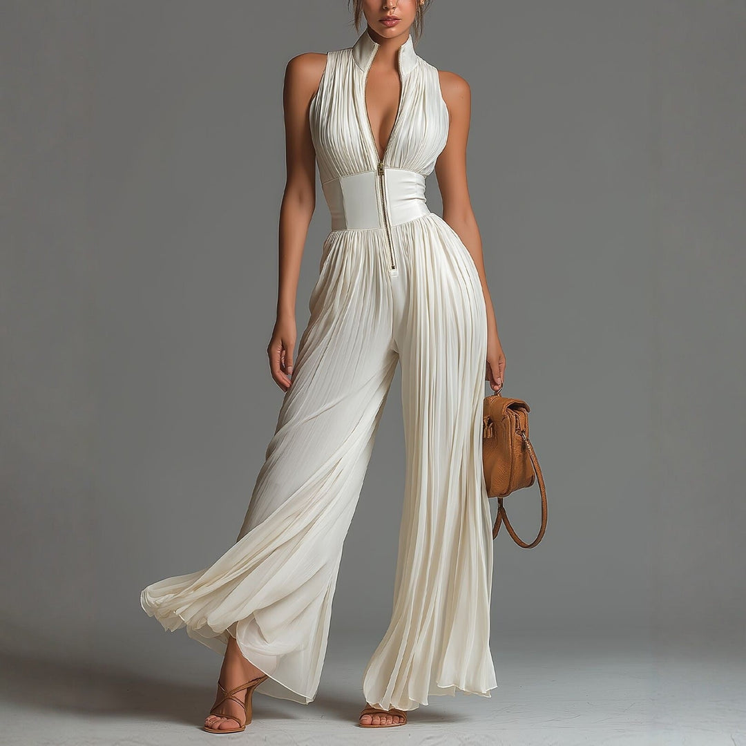 Tuta in chiffon bianca senza maniche con scollo a V, zip e pantaloni a gamba larga plissettati