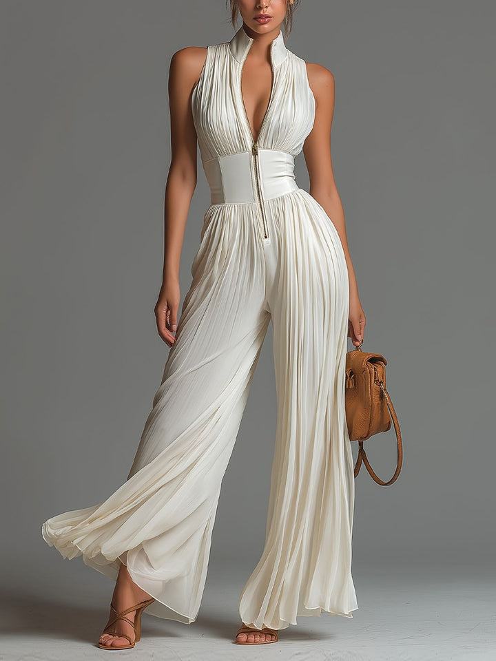Tuta in chiffon bianca senza maniche con scollo a V, zip e pantaloni a gamba larga plissettati