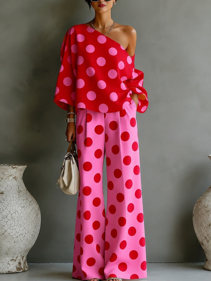Top off-shoulder a pois rosa retro e pantaloni a gamba larga due pezzi