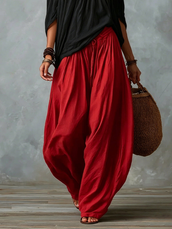 Top Nero Off-shoulder e Pantaloni Lantern Rossi Scollo Largo