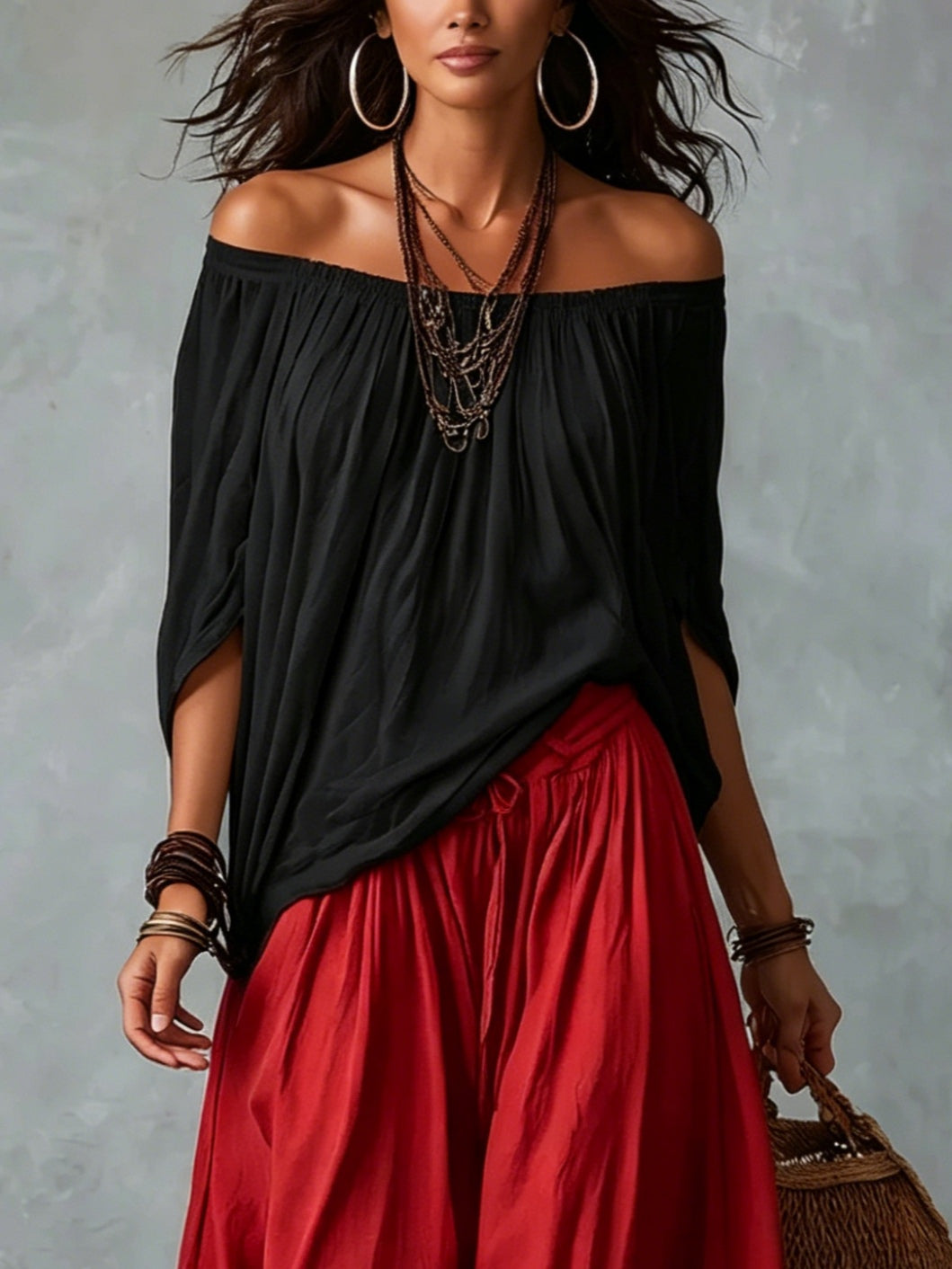 Top Nero Off-shoulder e Pantaloni Lantern Rossi Scollo Largo