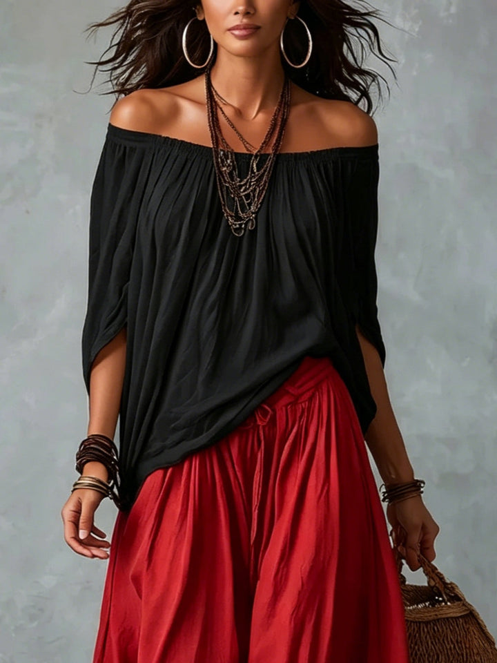 Top Nero Off-shoulder e Pantaloni Lantern Rossi Scollo Largo